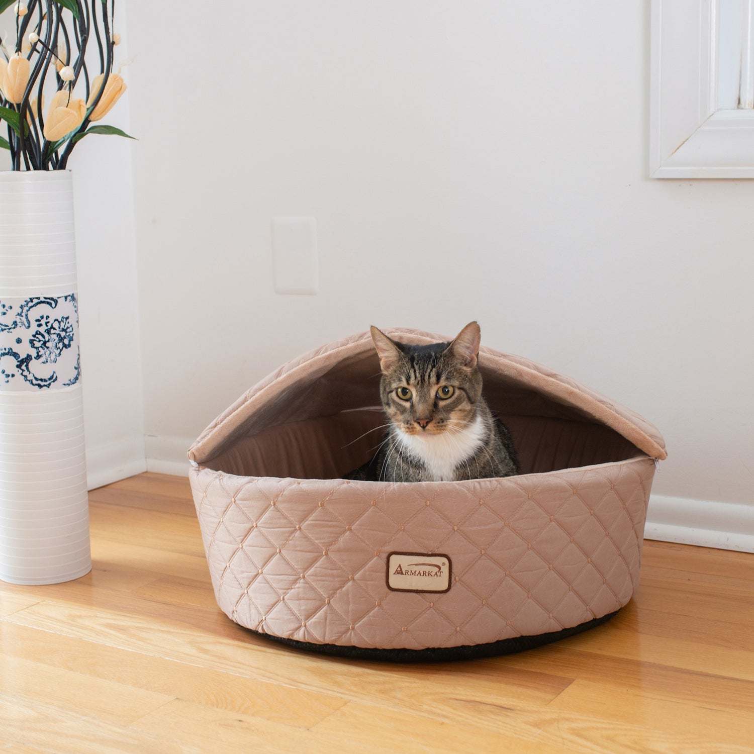 Light apricot Armarkat AeroMark C33HFS-FS-S small cat bed by Rose Chloe, cozy and soft with cushioned sides for feline comfort.