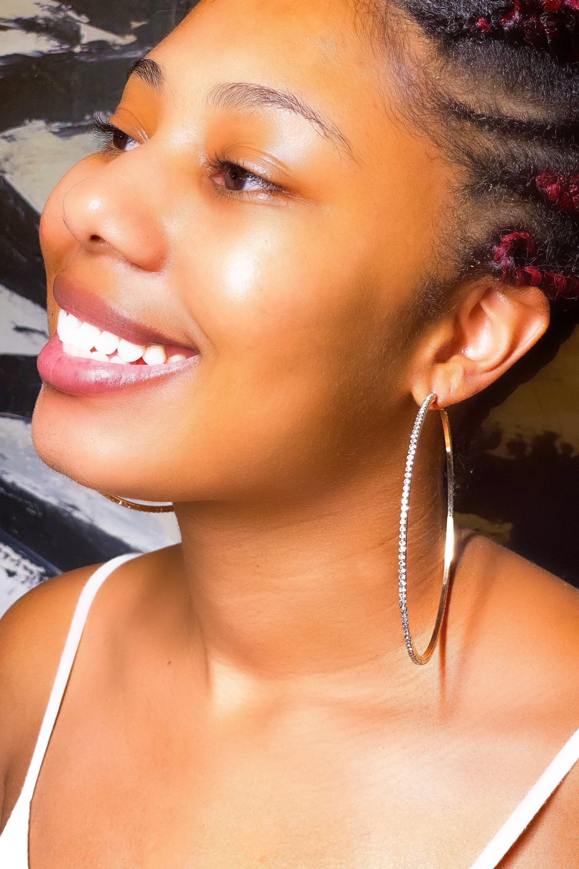 Burgundy Uranus hoop earrings featuring a stylish, round design, perfect for casual or chic outfits.