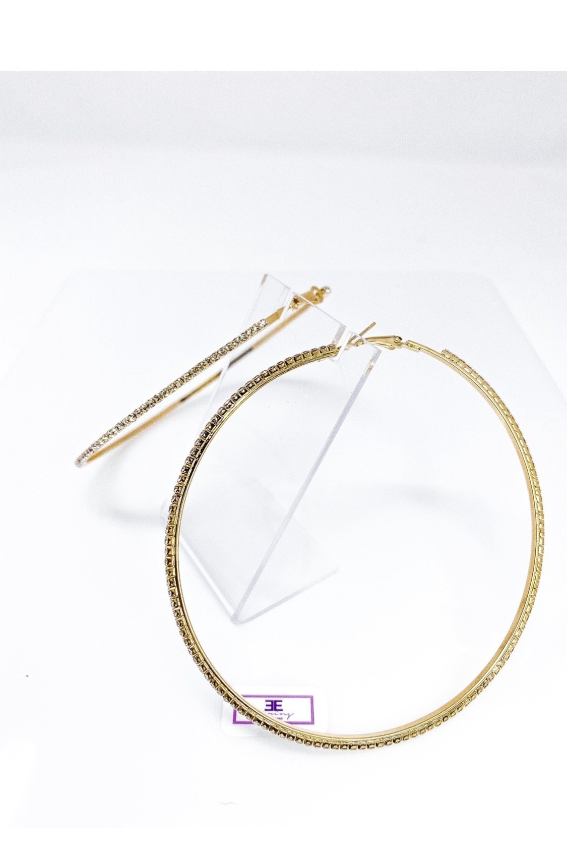 Burgundy Uranus hoop earrings called Around The Way Girl, featuring large gold-tone hoops with stylish design details.