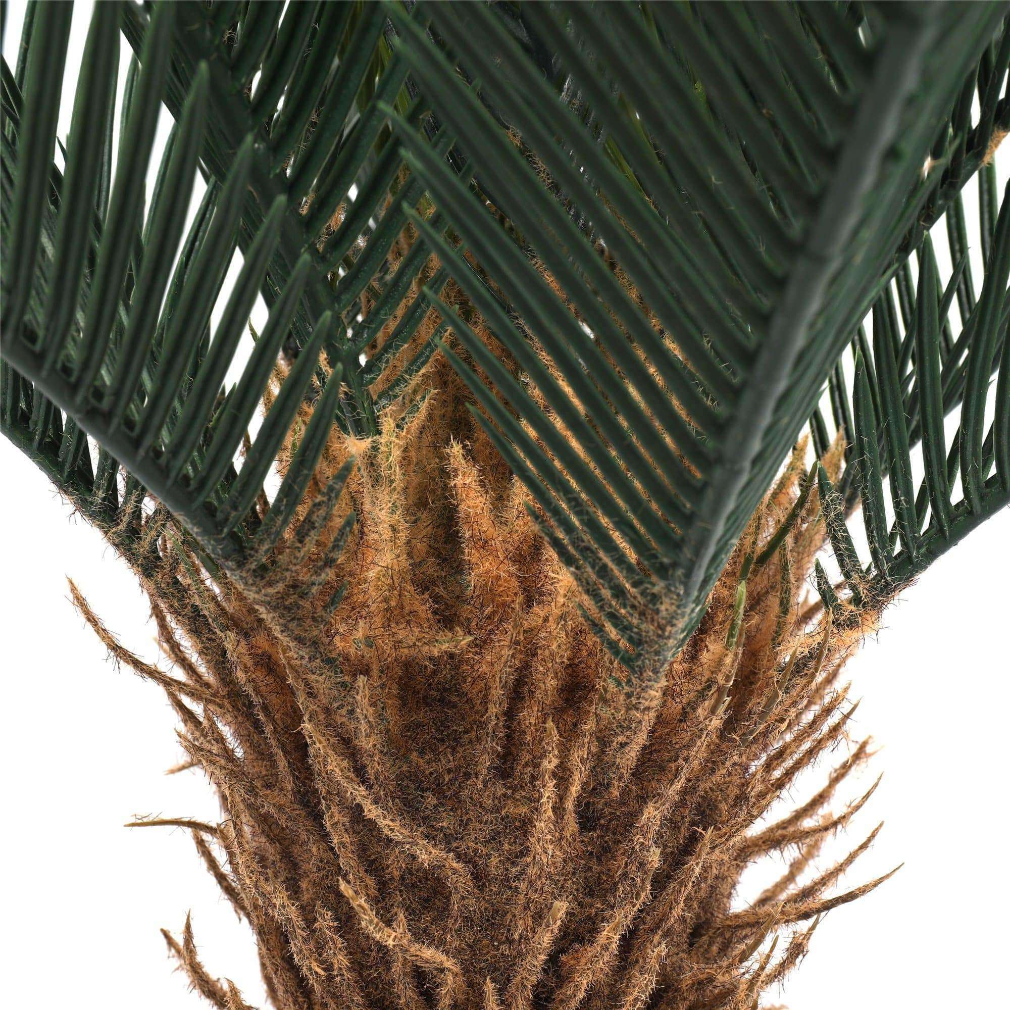 Artificial Cycad plant by Lemon Artemis, 60cm tall, ideal for home decor, featuring lush green fronds and realistic foliage.