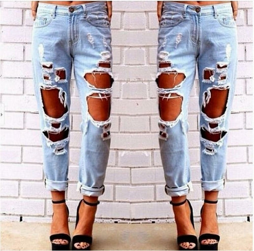 Blue Charlie ripped denim joggers for women with knee holes, slim fit blue jeans, perfect for casual home and outdoor wear.