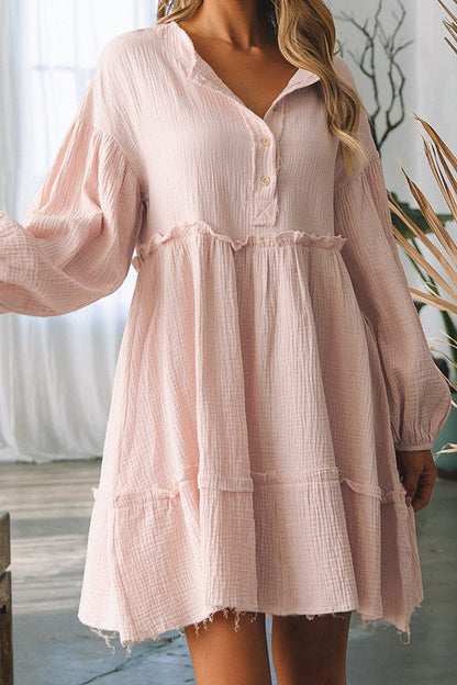 Women’s crinkle distressed puff sleeve flared dress by Jade Icarus, featuring a stylish, textured fabric and flowing silhouette.