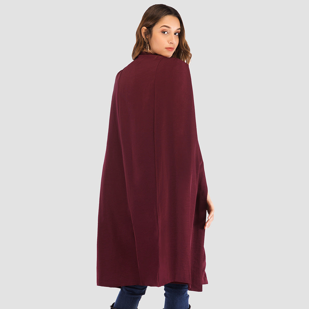 Carmine Juneberry Urban Cloak Cape Coat 25 Edition, stylish jacket with a layered cape design, in dark fabric, front view.