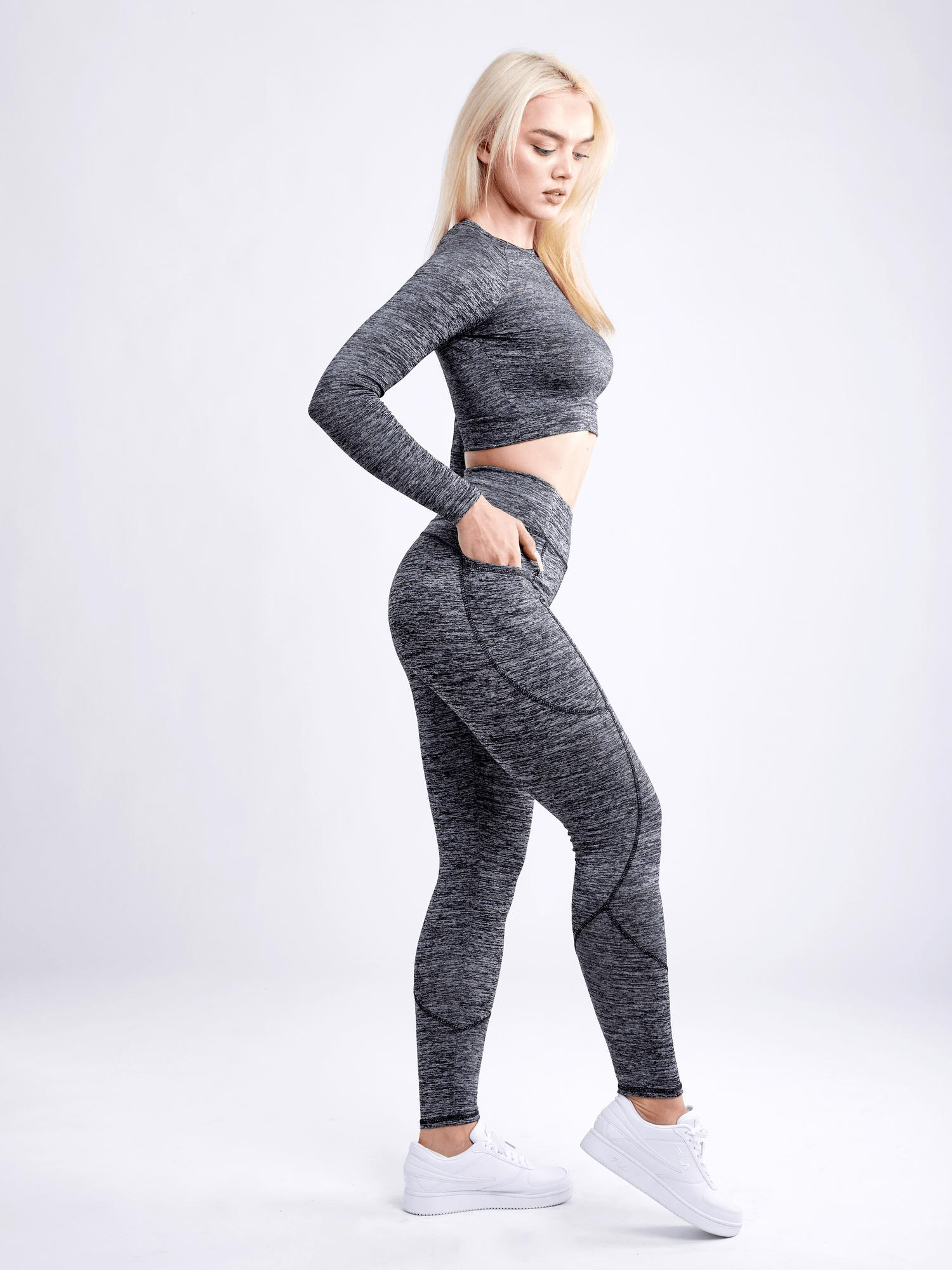 Black Lavender JupiterGear long-sleeve crop top, activewear, lightweight fabric with fitted design, suitable for workout or casual wear.