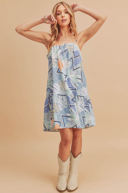 Jade Icarus Aemi + Co printed ruffled hem square neck mini cami dress for women, lightweight with floral print and ruffled hem detail.