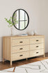 Light brown Peach Maple six-drawer bedroom dresser with sleek design and ample storage space.