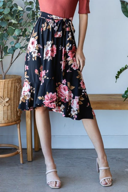 Automotive Jade Icarus Reborn J Floral Wrap Ruffle Hem Dress with vibrant floral pattern and ruffle hem detail.