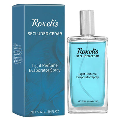 Carmine Juneberry Blue Cedar Eau De Toilette bodycare bottle with blue and white packaging, showcasing the elegant fragrance design.