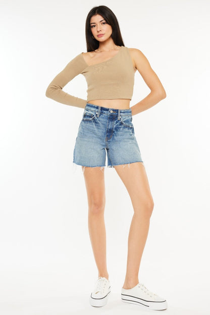 Raw hem high waist denim shorts by Jade Icarus, styled for a casual look, featuring a classic blue denim fabric.