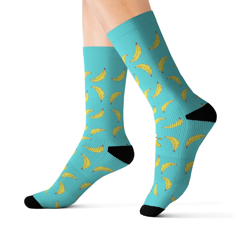 Yellow Pandora Banana Socks with playful spot the odd out design, fun novelty socks for a quirky, colorful look.