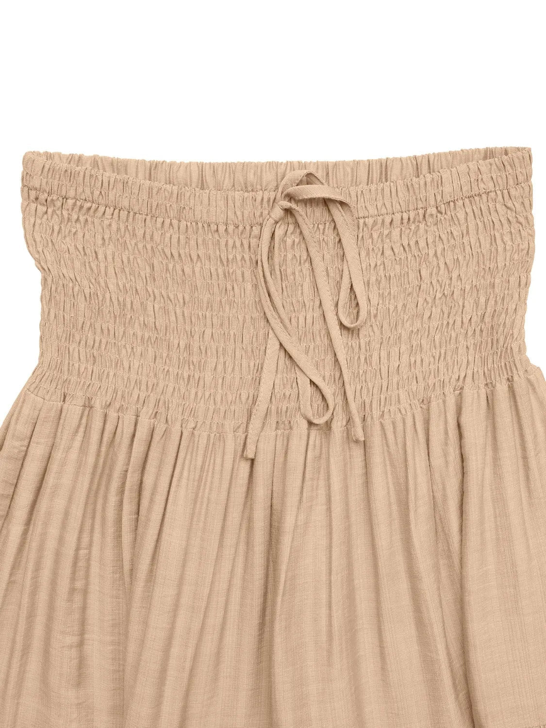 Rust-colored smocked tiered skirt for women by Ruby Styx, featuring a flowy, layered design and elastic waistband.