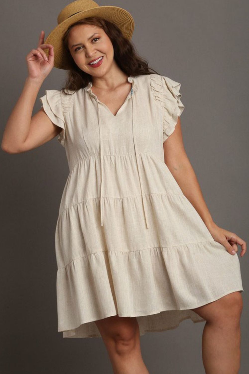 Jade Icarus Umgee plus size linen A-line tiered mini dress for women, featuring a relaxed fit and feminine tiered design.