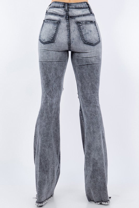 Grey Storm Bell Bottom Jean by Jade Icarus, featuring high-waisted fit and flared leg design, shown on a model.