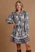 Two-tone floral border print tie waist mini dress by Jade Icarus, featuring a full-size design with vibrant floral patterns.