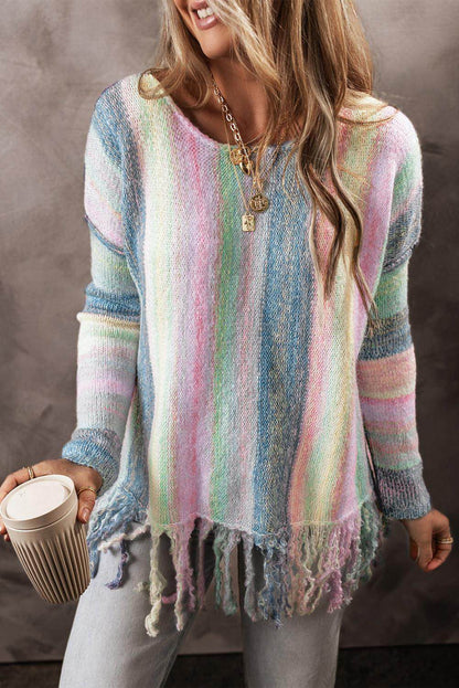 Purple color block fringed drop shoulder sweater from Carmine Juneberry, featuring a cozy tunic style with fringe detailing.