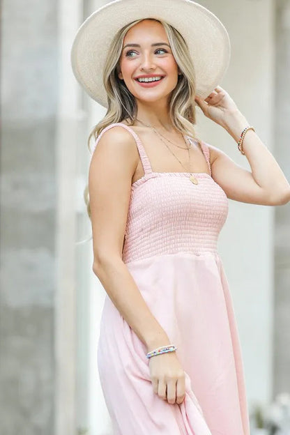 Jade Icarus smocking open-back sleeveless midi dress for women, featuring a stylish design and comfortable fit.