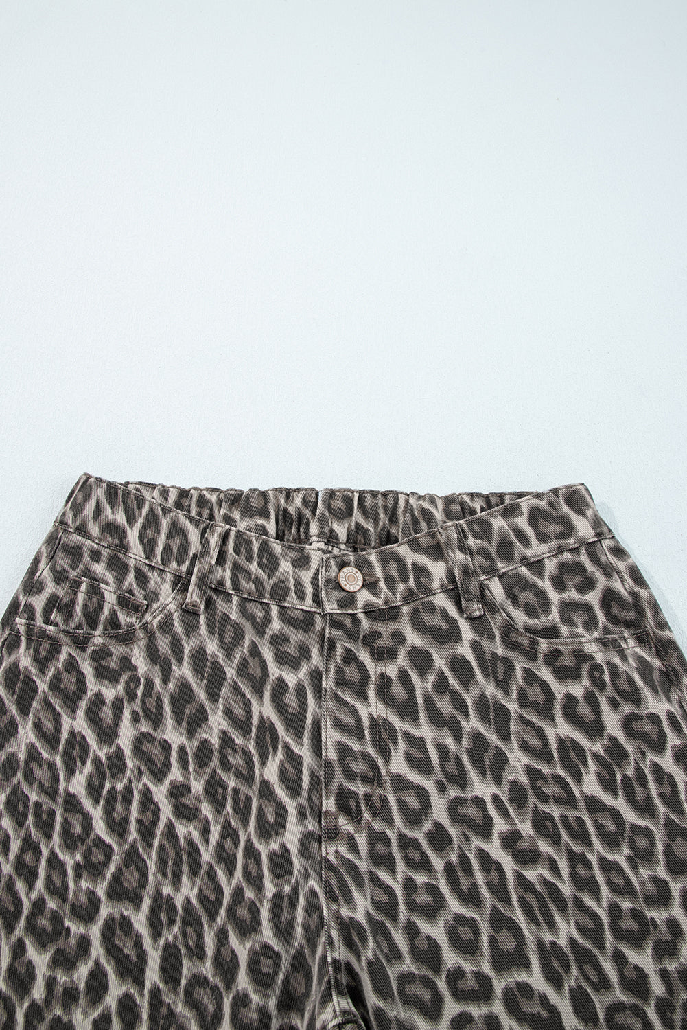 Leopard print denim straight leg jeans for women by Byzantium Bay, showing the stylish design and fit.