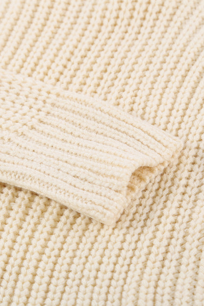 Beige wrap V-neck sweater with side tie from Harlequin Daisy, perfect for cozy bath and beauty lounging.