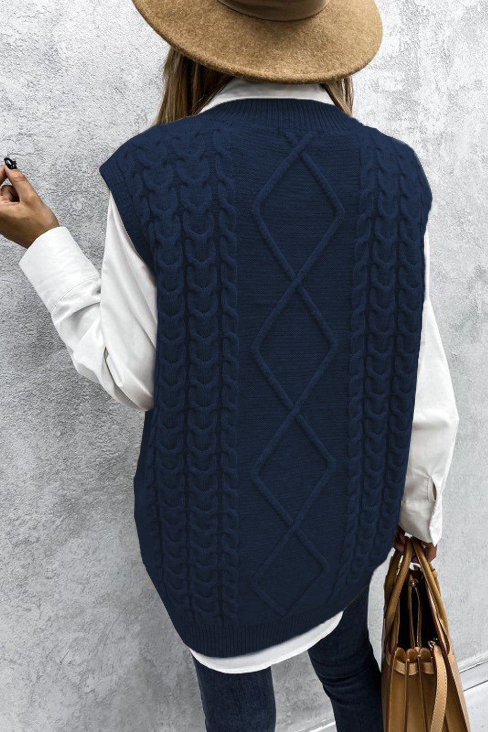 Blue sleeveless cable knitted sweater tank for women by Lavender Pallas, featuring a cozy, stylish knit design.