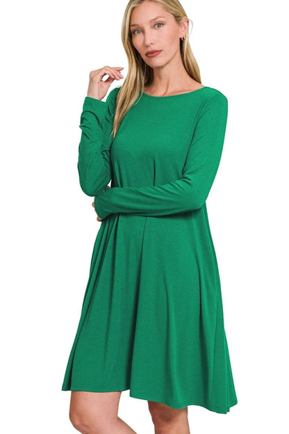 Automotive image of Jade Icarus Zenana long sleeve flare dress with pockets, showcasing its stylish design and fabric details.