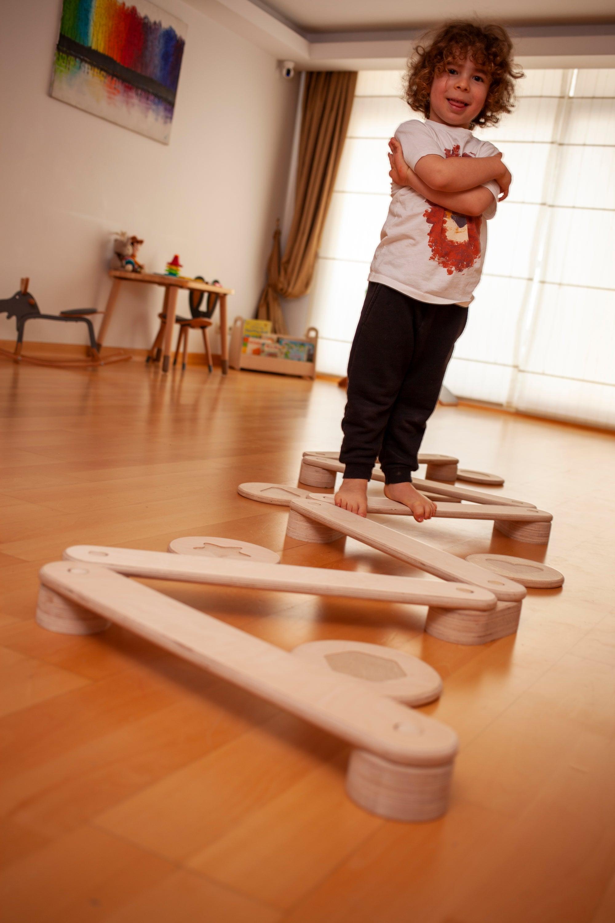 Red Oceanus Montessori balance beam and stepping stones set, featuring wooden balance beam and colorful stepping stones for children&