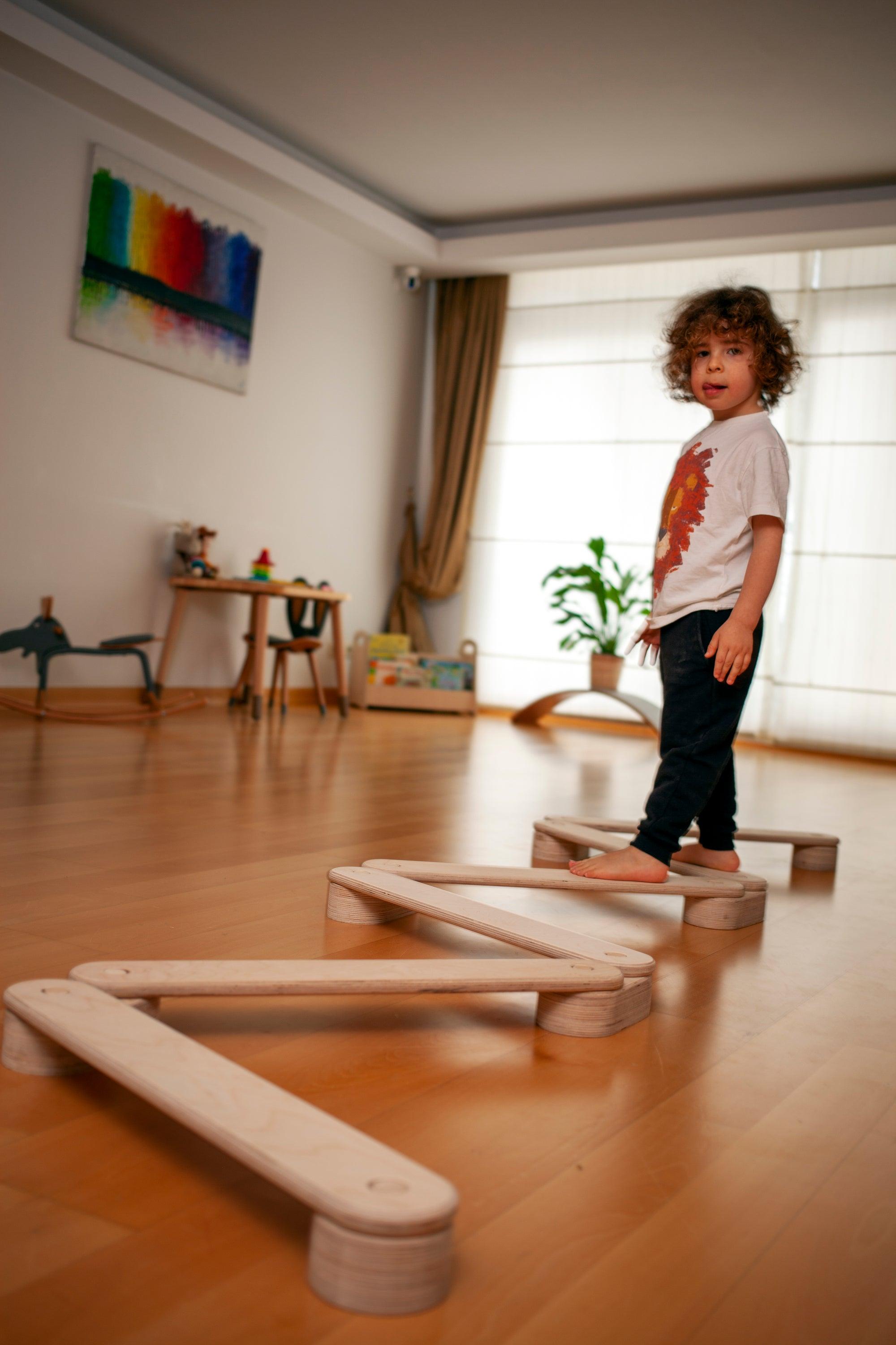Circular wooden balance beam set by Red Oceanus, featuring multiple sturdy wooden beams for balance training and exercise.