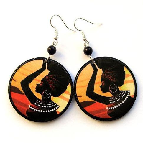 Wooden African woman painted earrings by White Baobab showcasing traditional handcrafted earrings with vibrant tribal artwork.