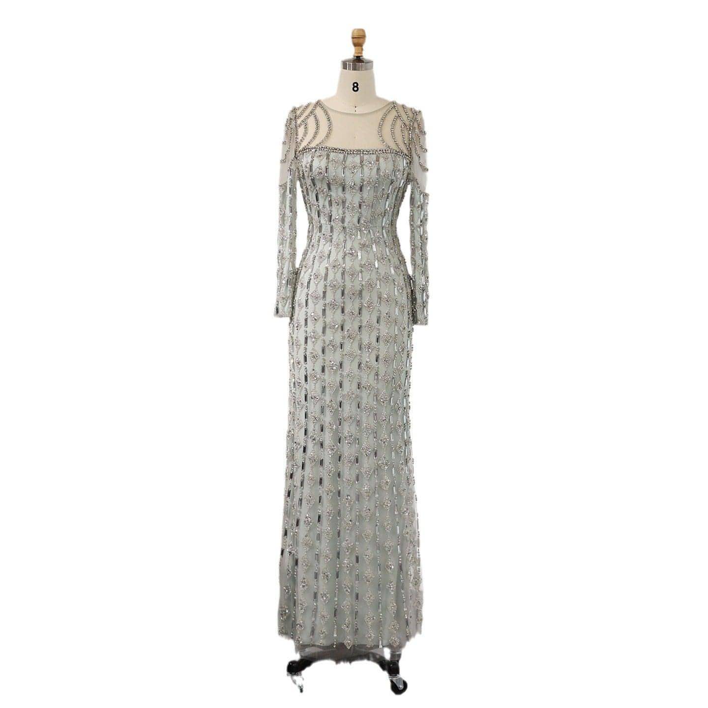 Long sleeve slim fishtail dress by Carmine Juneberry featuring a fitted silhouette and elegant design.