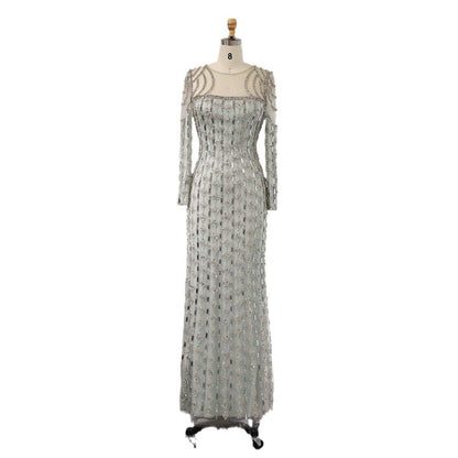 Long sleeve slim fishtail dress by Carmine Juneberry featuring a fitted silhouette and elegant design.