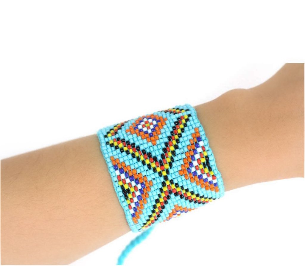 Ariel geometric beaded cuff bracelet with intricate bead patterns and a stylish design on a white background.
