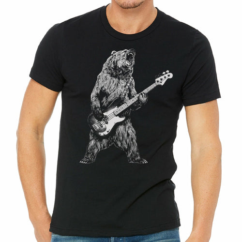 Black T-shirt featuring a bear playing bass guitar design by Indigo Tiger, with a detailed illustration of the bear.