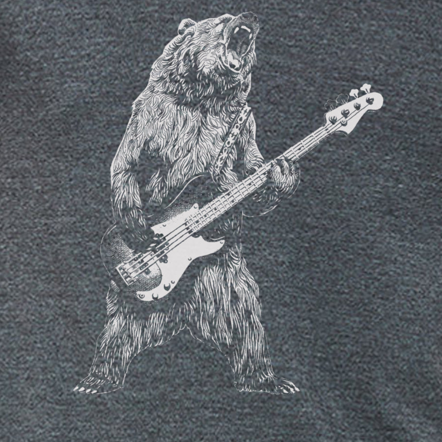 Indigo Tiger T-shirt featuring a playful bear illustration playing a bass guitar on a casual, stylish graphic tee.