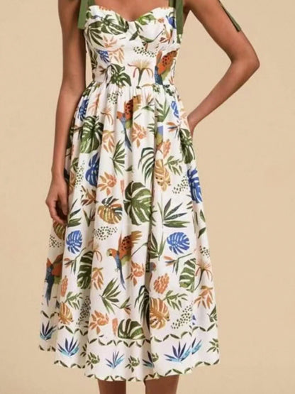 Carmine Juneberry tropical print tie-shoulder midi dress with sweetheart neckline, perfect for summer gifts, shown on a hanger.