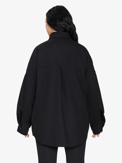 Rose Eleusis oversized patch pocket shacket featuring a relaxed fit, button closure, and stylish patch pockets in a versatile jacket design.