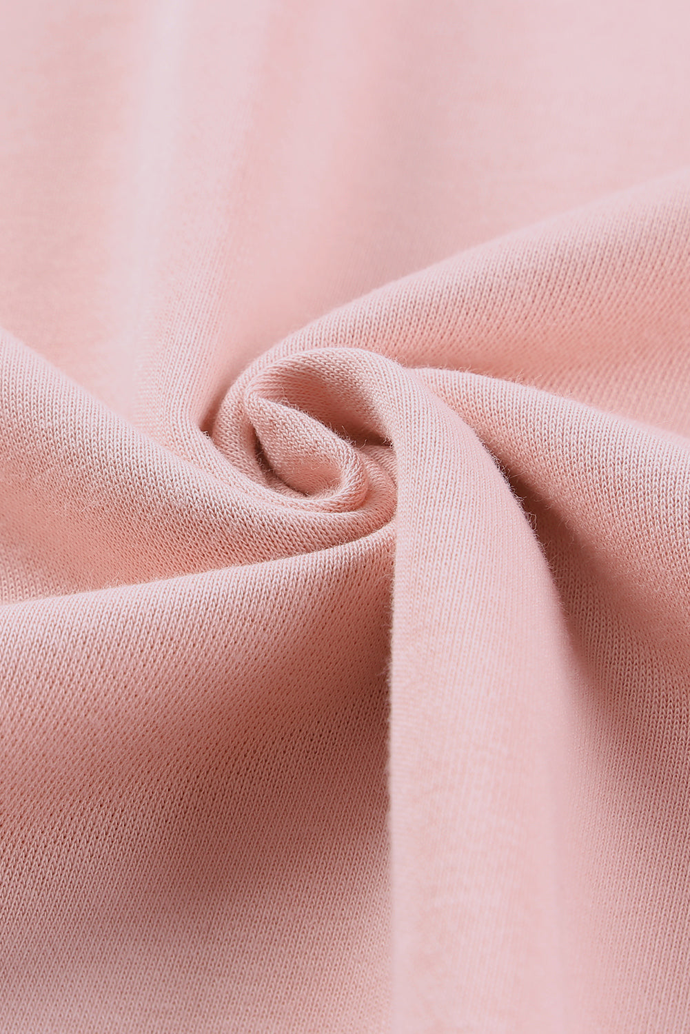 Pink crew neck sweatshirt with slit buttons from Harlequin Daisy, perfect for casual bath and beauty lounge wear.