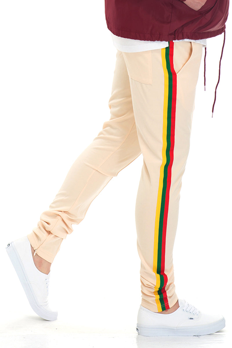 Lime Milo Rasta track pants featuring vibrant Rastafarian-inspired colors and comfortable athletic design.