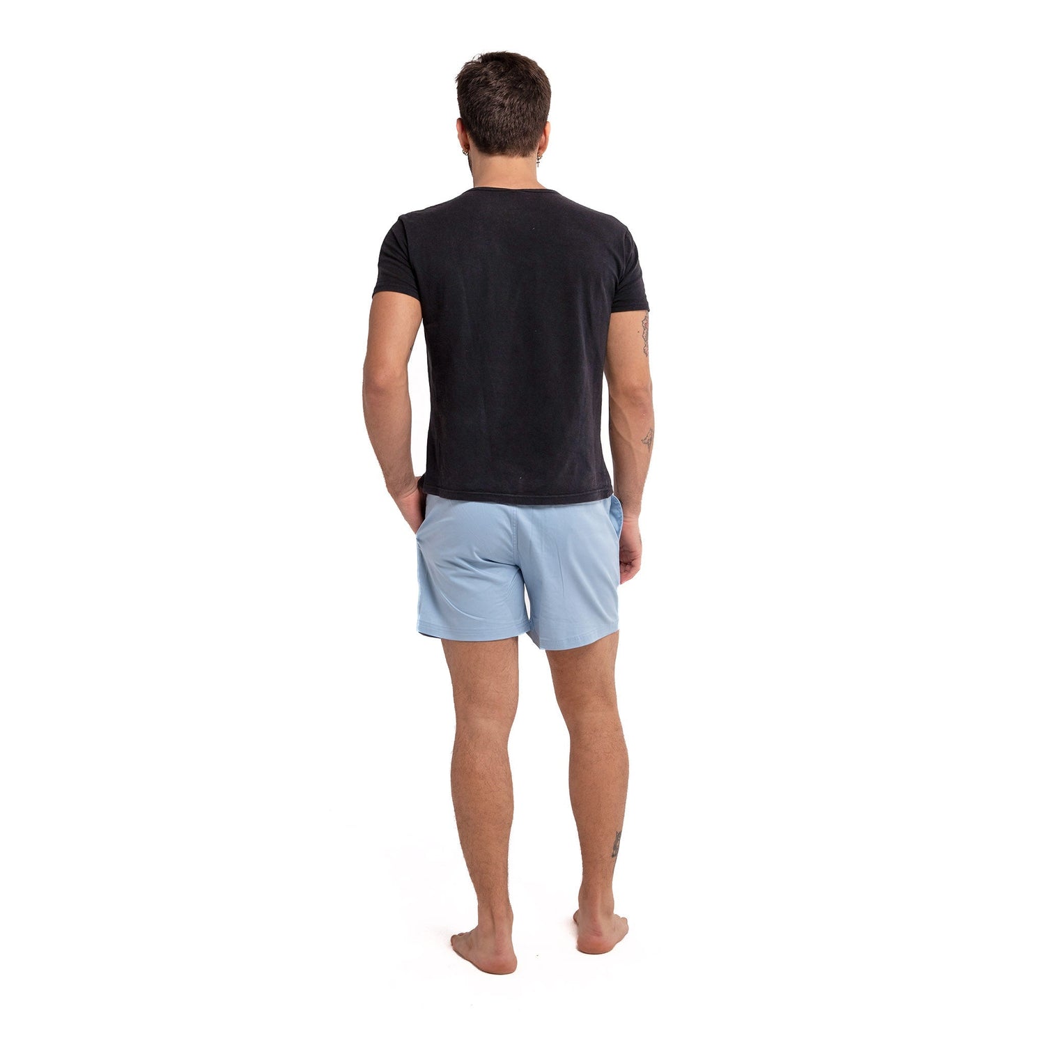 Blue cotton swim shorts by Ruby Tartarus, featuring a relaxed fit and comfortable waistband, perfect for beach or poolside wear.