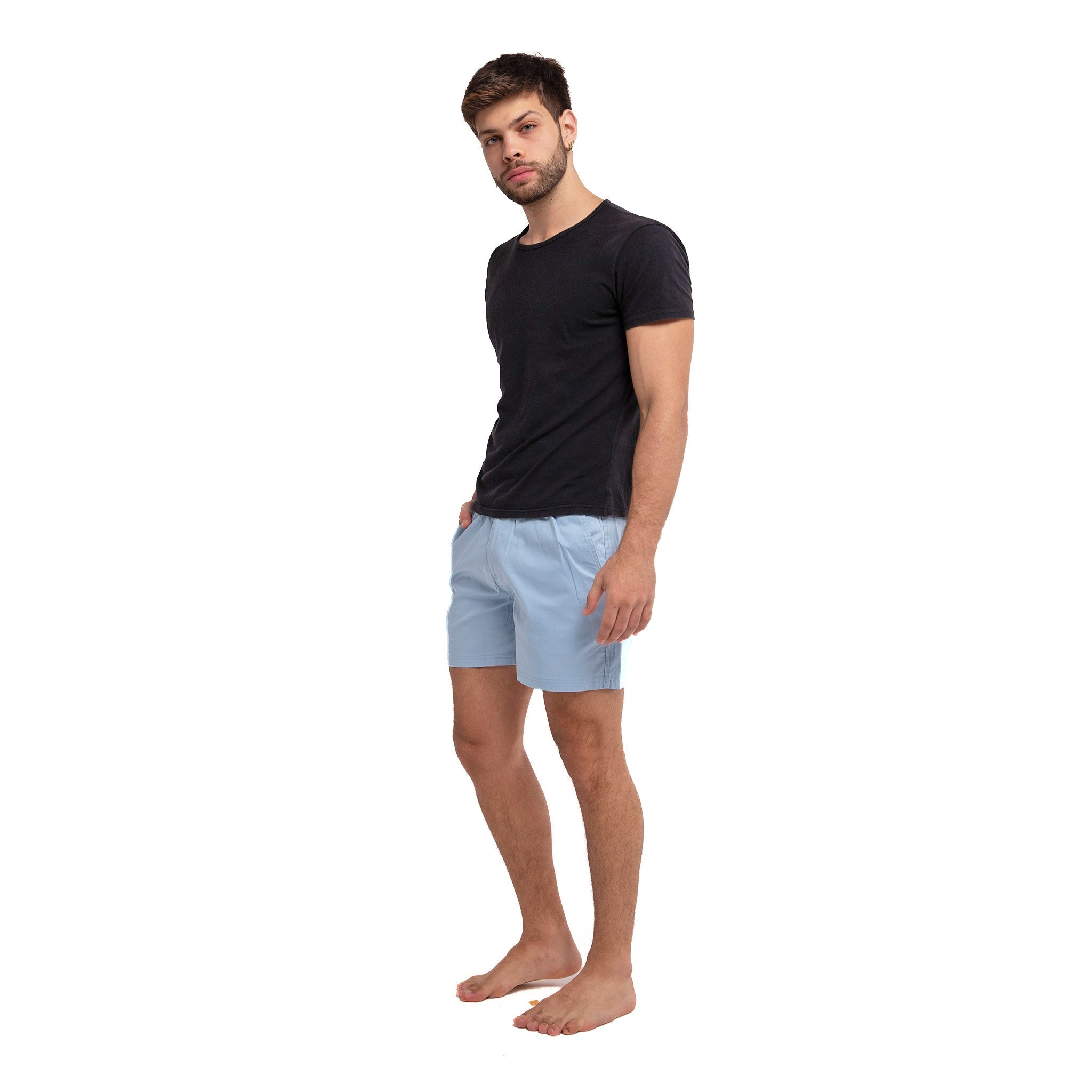 Blue cotton swim shorts by Ruby Tartarus with a relaxed fit, displayed on a neutral background.