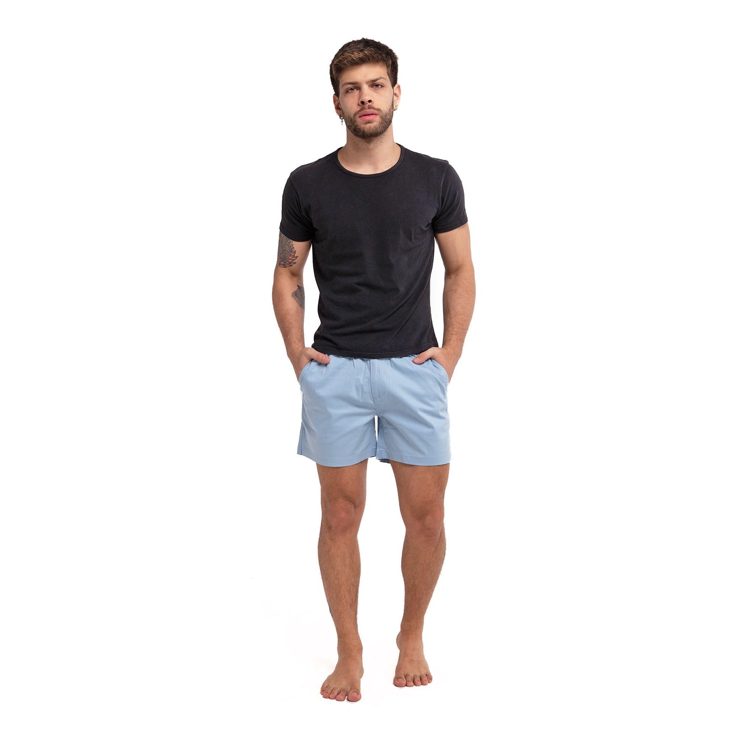 Blue cotton swim shorts by Ruby Tartarus featuring a relaxed fit and casual style, perfect for beach or poolside wear.