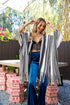 Gray boho chic frayed edge ruana by Periwinkle Aether, featuring a relaxed, one-size accessories with stylish frayed hem.