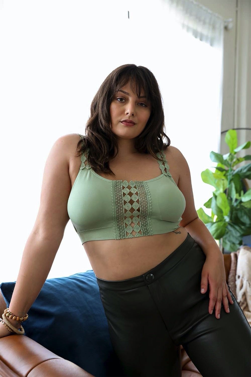 Periwinkle Aether Eye Lace Applique Bralette in sage, boho style, showcasing intricate lace design and comfortable fit.