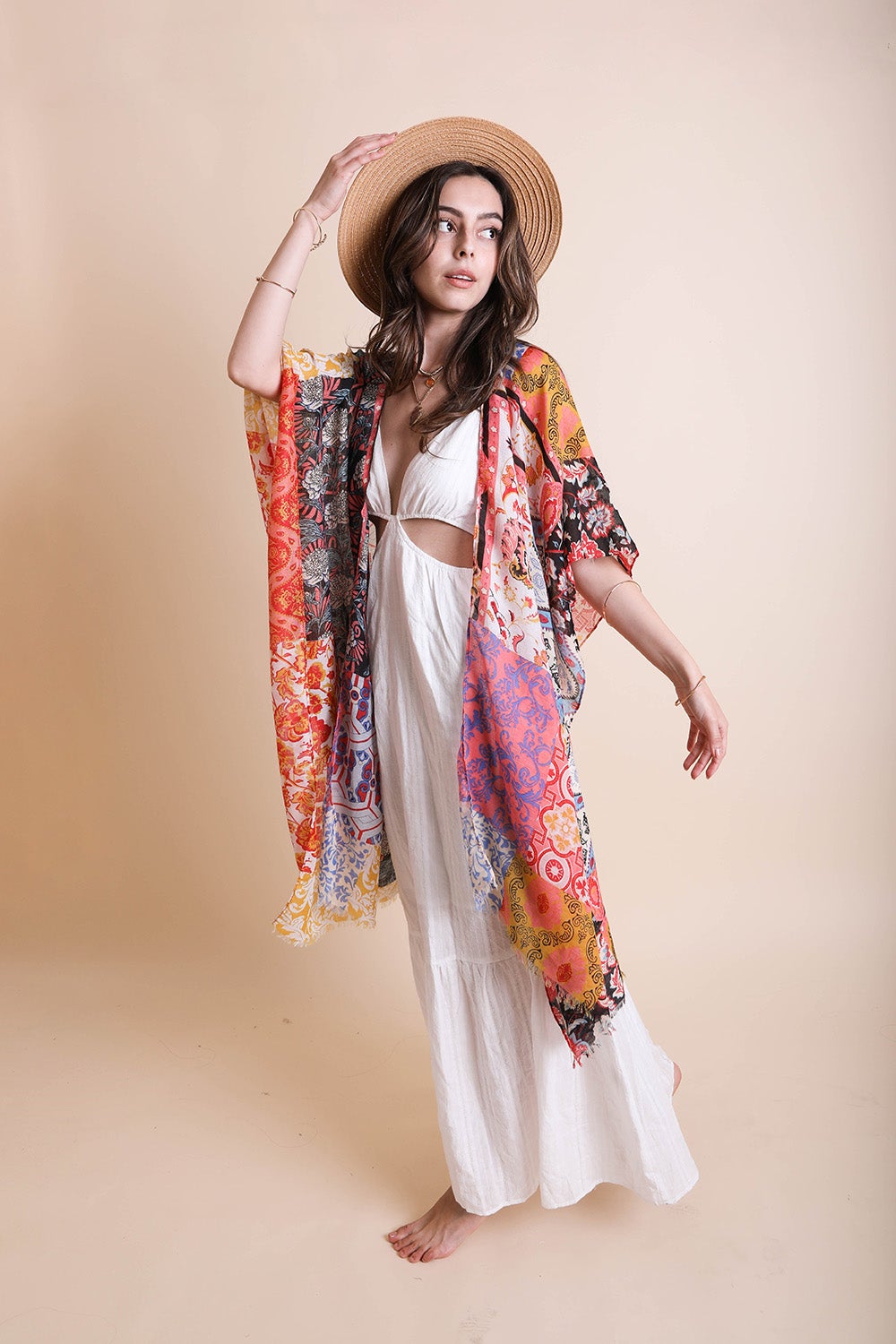 Blue boho patchwork kimono from Periwinkle Aether, styled as a versatile accessories piece with vibrant patchwork details.