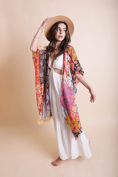 Blue boho patchwork kimono from Periwinkle Aether, styled as a versatile accessories piece with vibrant patchwork details.