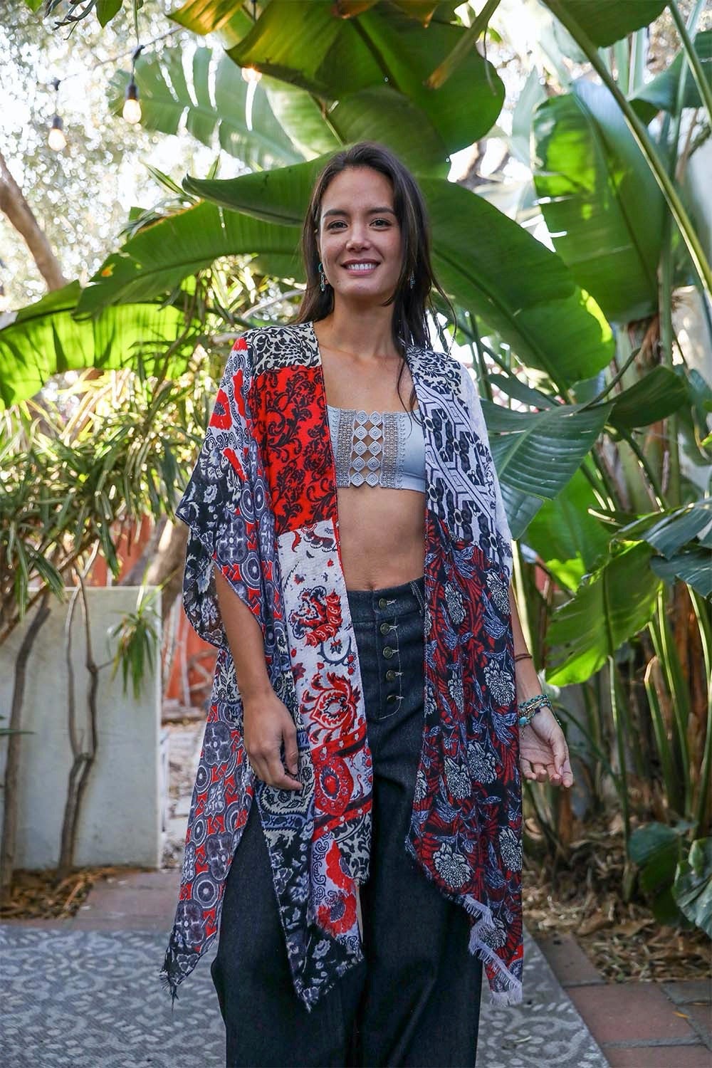 Red boho patchwork kimono accessory by Periwinkle Aether, featuring colorful patchwork and flowing fabric design.