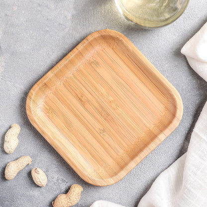 Bamboo square plate, 5-inch by 5-inch, from Blue Hades, ideal for appetizers, with a natural wood finish.