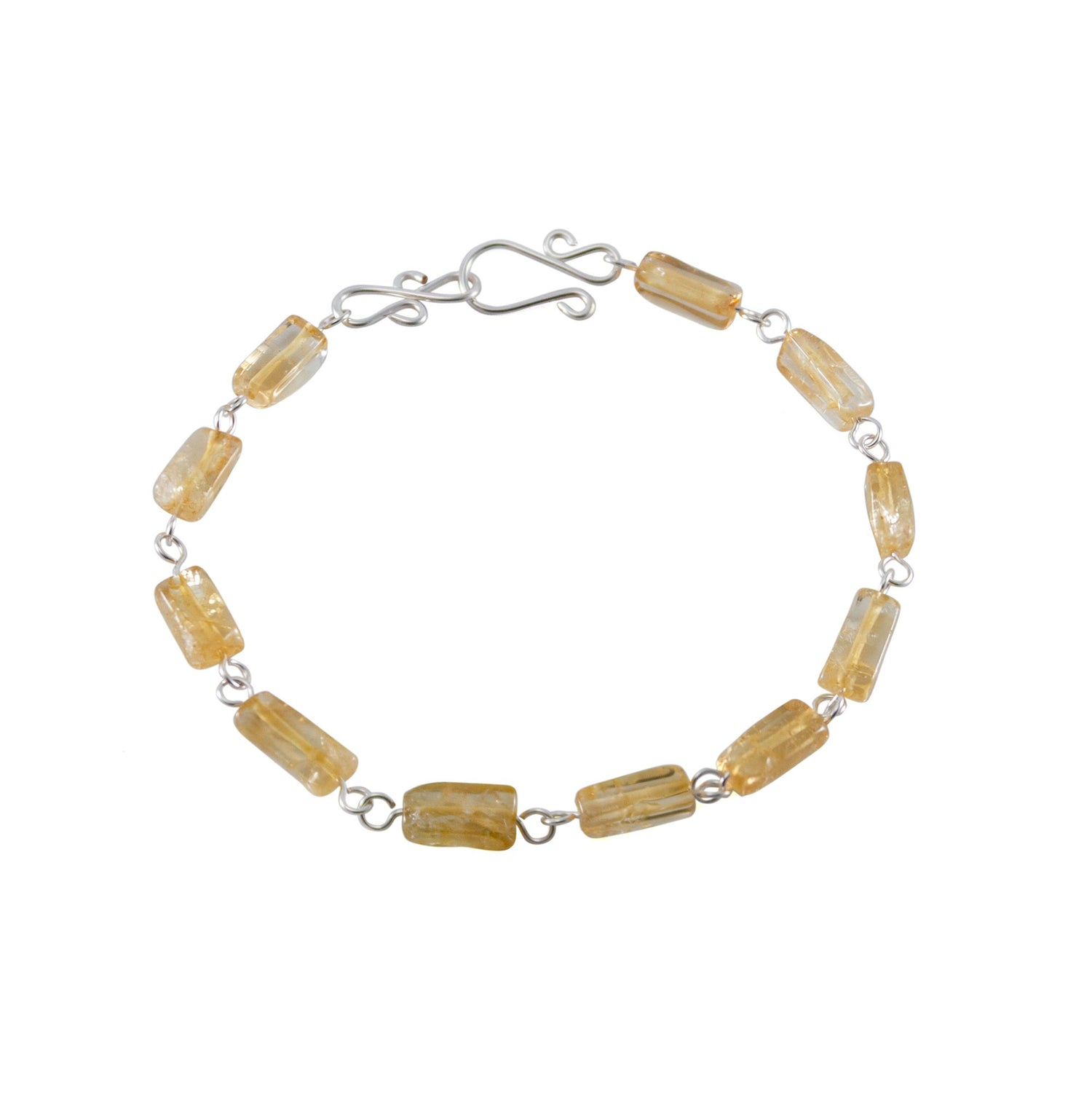 Silver rectangular link bracelet featuring citrine stones, crafted by Grey Clymene, showcasing elegant jewelry design.