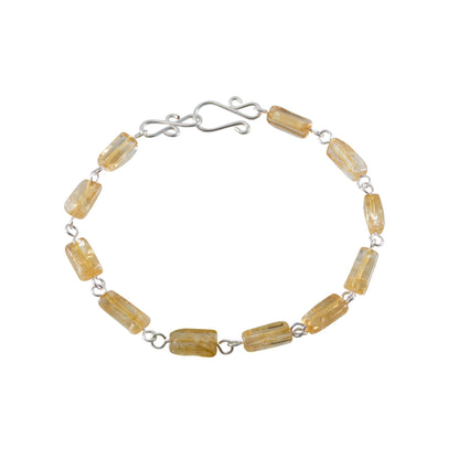 Silver rectangular link bracelet featuring citrine stones, crafted by Grey Clymene, showcasing elegant jewelry design.