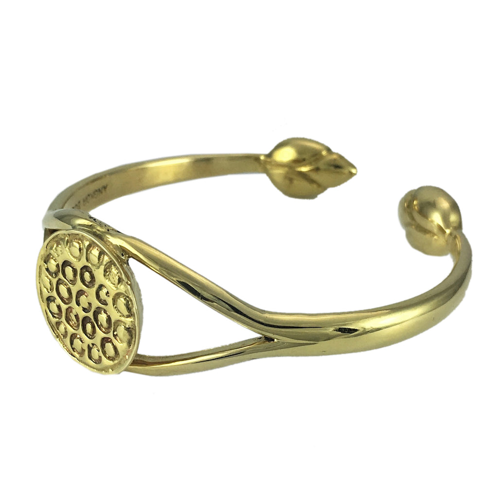 Ariel Bombshell Lotus brass cuff bracelet with intricate floral design and open-ended style, stylish jewelry accessory.