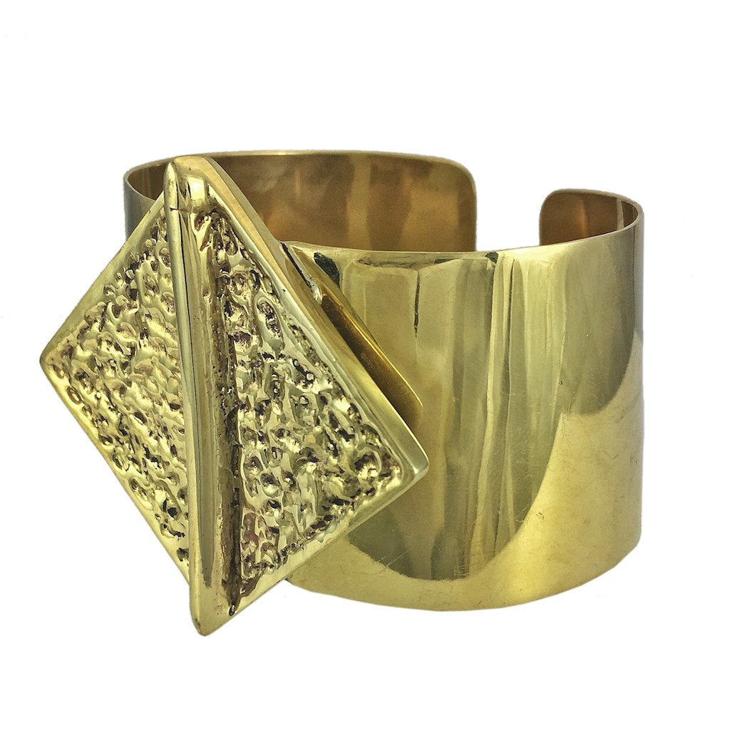 Brass Hammered Bombshell Cuff bracelet by Ariel featuring a textured hammered finish and bold, stylish design.
