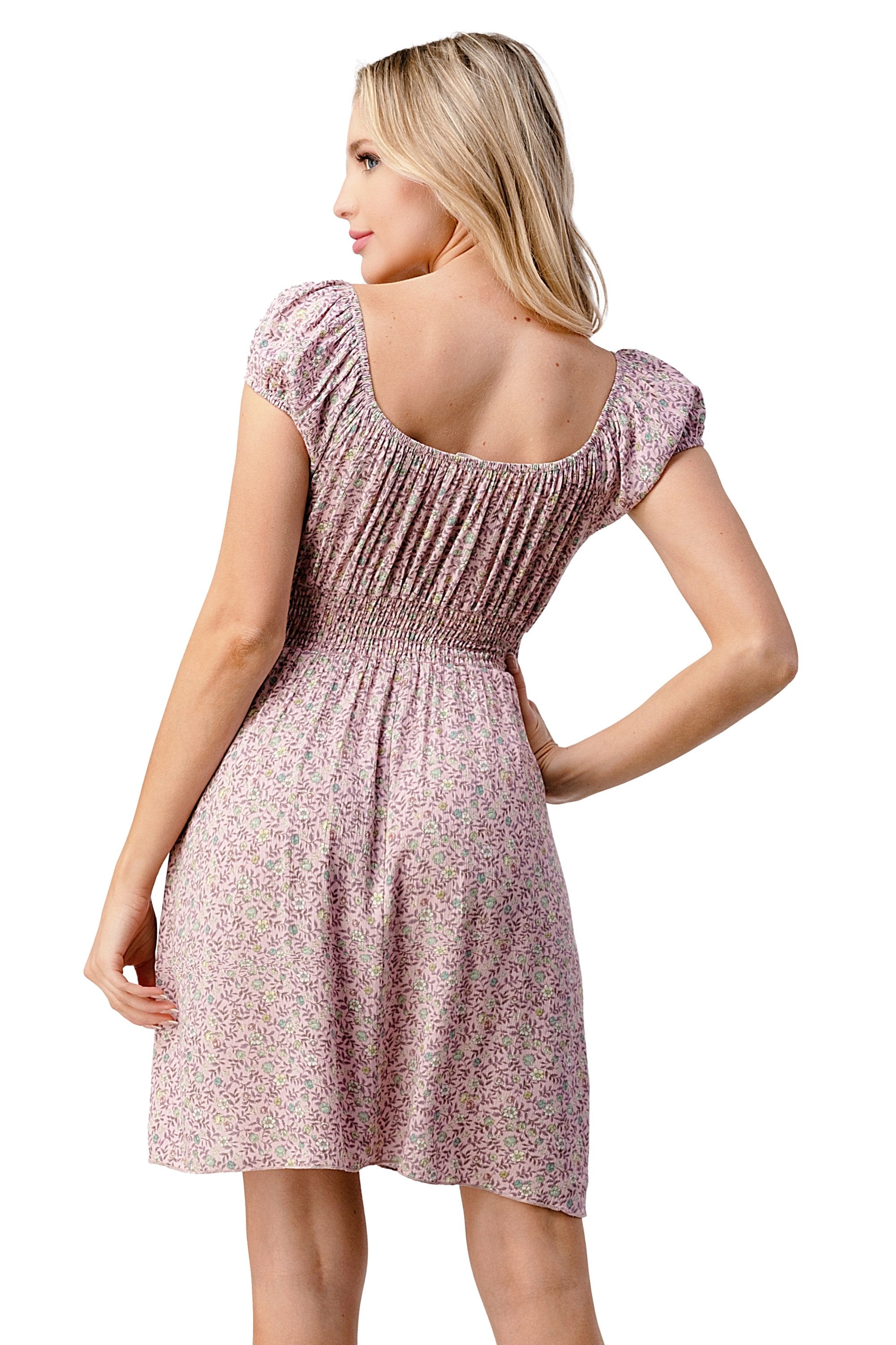 Emma dress by Indigo Arrowwood featuring bow tie front, cap sleeves, and a daisy floral pattern for women&